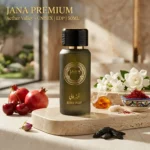 Aether Valley perfume 50ml bottle by Jana Premium with pomegranate, saffron, and amber stones on a luxury stone base.